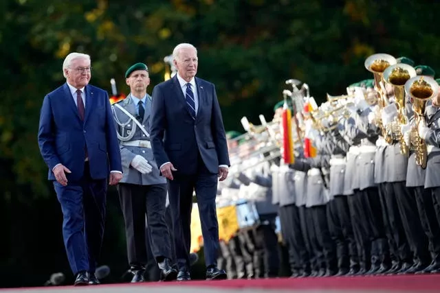 US President Joe Biden and German President Frank-Walter Steinmeier inspect a military honour guard