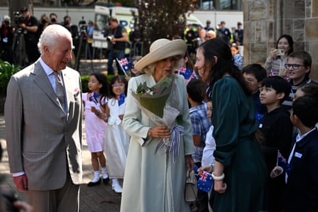 The king and queen greet visitors