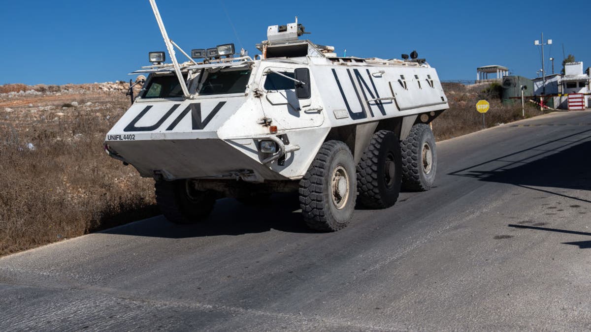 MARJAYOUN, LEBANON - OCTOBER 5: A UNIFIL (United Nations Interim Force In Lebanon) armoured personnel carrier departs a base to patrol near the Lebanon-
Israel border on October 5, 2024 in Marjayoun, Lebanon. Israel continued airstrikes on Beirut and its southern suburbs as its military announced a ground offensive in Lebanon, part of what it said would be a "limited" incursion to target Hezbollah forces. Photo: Carl Court/Getty Images