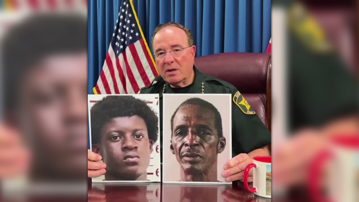 Polk County Sheriff Grady Judd holds two mugshots