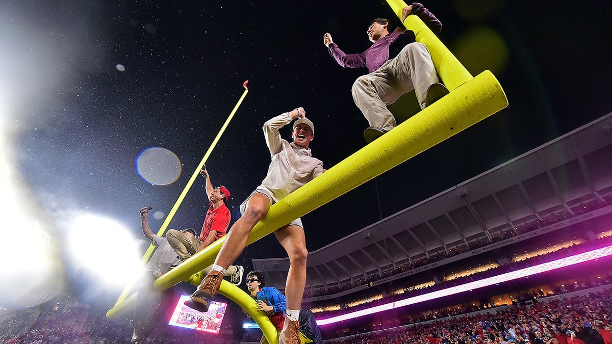 Ole Miss fans on goal post