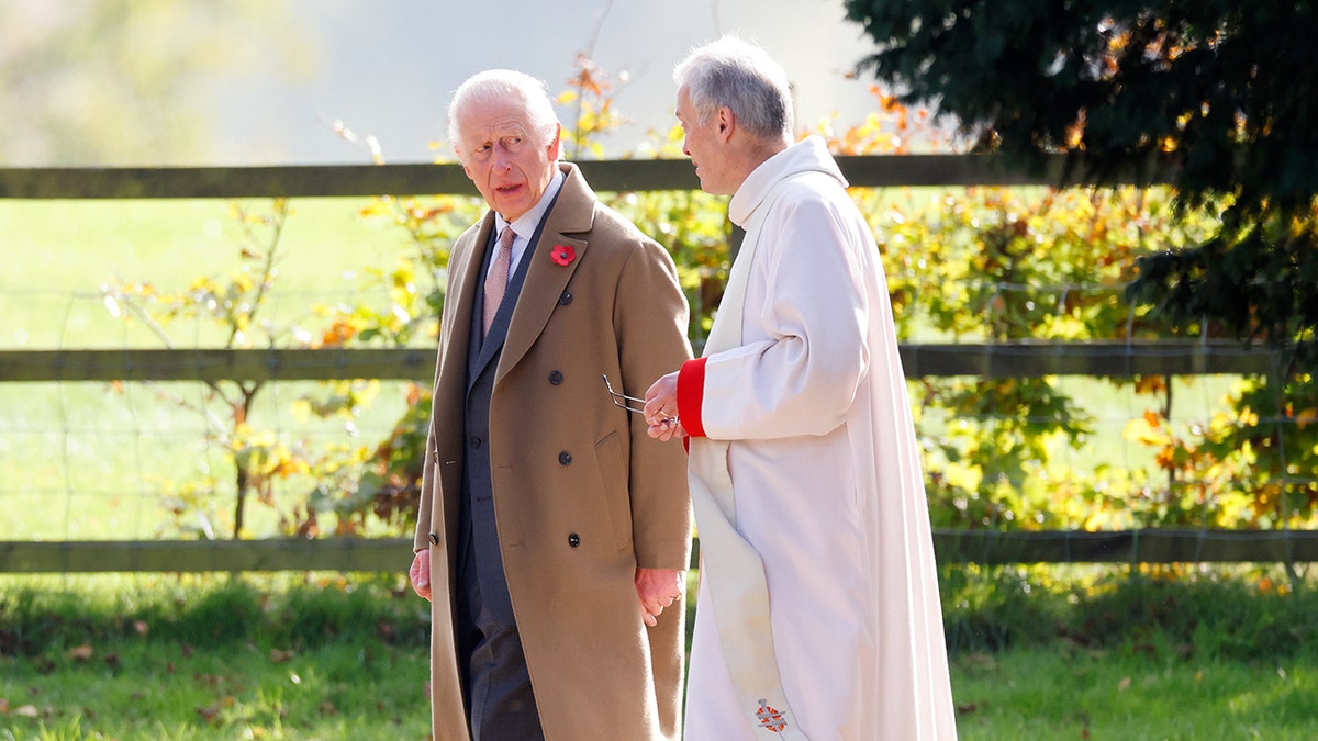 King Charles with a reverend in Sandringham this year