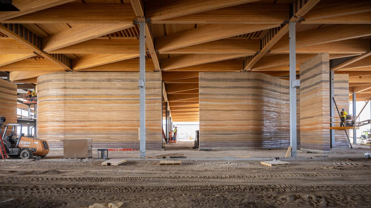 A photo shared exclusively first with Fox News Digital shows a set of already completed massive, rammed-earth walls, composed of a mixture of gravel, sand, silt and clay.